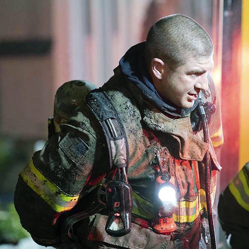 Concord Firefighter CJ Girard is shown on duty at a four-alarm fire on Rumford Street in August 2022. Girard, a father and resident of Bow, died unexpectedly this weekend. 
