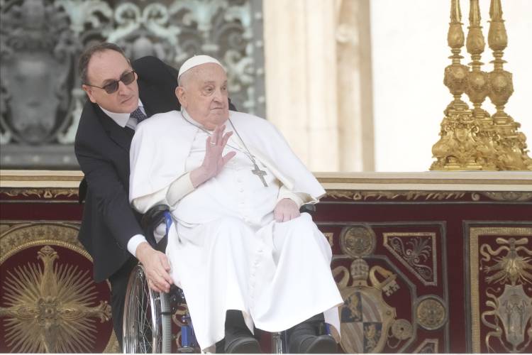 Pope Francis arrives at the end of the mass on Palm Sunday in St. Peter's Square at The Vatican, Sunday, April 13, 2025. (AP Photo/Gregorio Borgia)