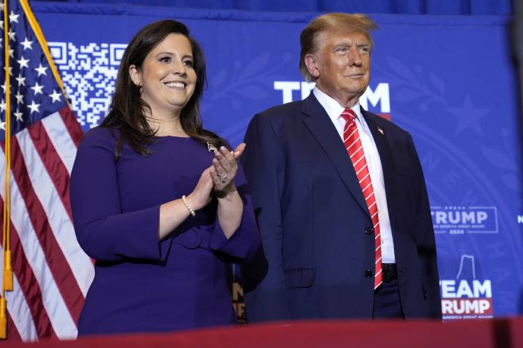 Rep. Elise Stefanik, R-N.Y., and Republican presidential candidate former President Donald Trump listen as former Rep. Lee Zeldin, R-N.Y., speaks at a campaign event in Concord, N.H., Friday, Jan. 19, 2024. (AP Photo/Matt Rourke)