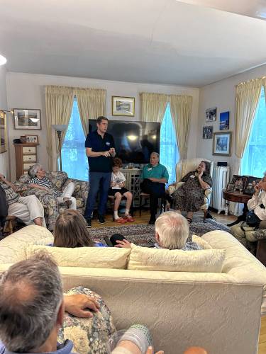 Prospective supporters listen as Colin Van Ostern, a Democratic candidate for New Hampshire’s second congressional district, talks during a recent house party in Concord.