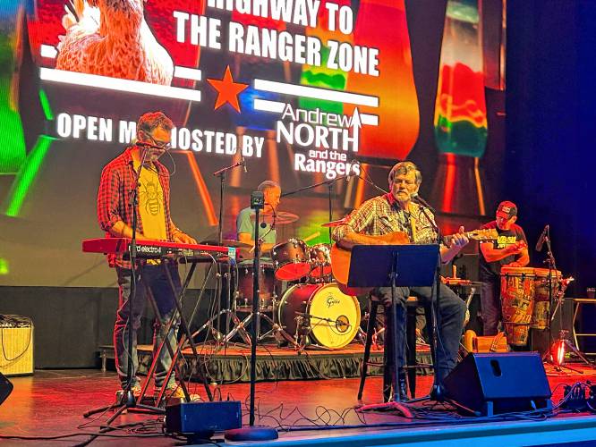 Andrew North with his band at open mic night playing alongside Dick Shaw, one of the regulars at the open mic night.