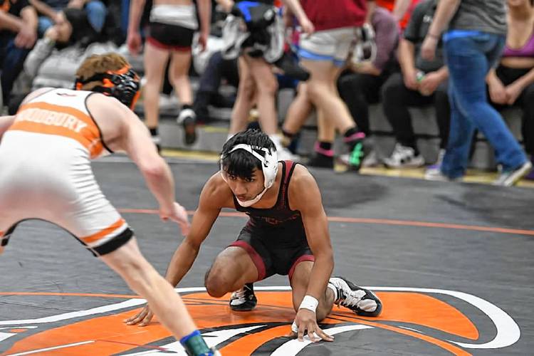 Concord’s Biswas Darji (right) wrestles in the 106-pound final against Keene’s Tristin Woodbury at the Keene Minickiello Holiday Wrestling Tournament on Saturday. Darji finished runner-up at 106, helping Concord win the team title.