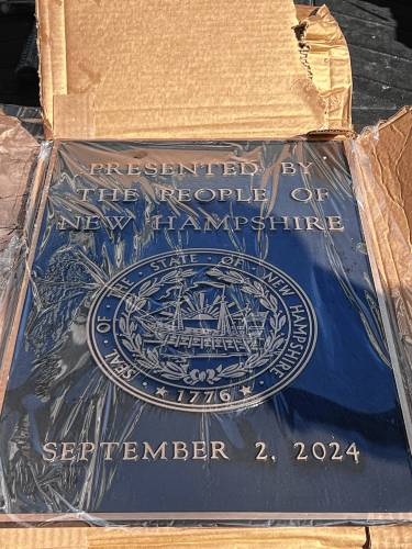 One of the plaques for the statue of Christa McAuliffe.