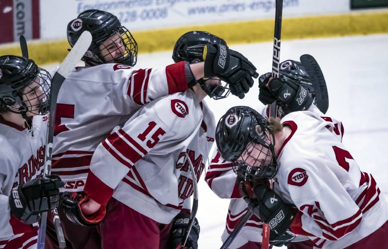 Concord’s Trevor Brown (right) celebrates with his teammates after a Tide goal against Londonderry at Everett Arena on Feb. 1. Concord had a lot to celebrate last season, finishing as the No. 1 seed and a 19-1 record, but the Tide ultimately fell short of the championship.