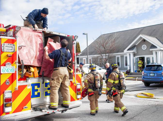 Area firefighters at the scene of a fire call at 4 Triangle Park Drive on Wednesday, February 21, 2024.