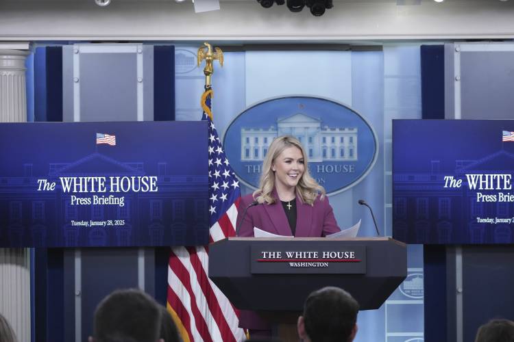 White House press secretary Karoline Leavitt arrives to speak with reporters in the James Brady Press Briefing Room at the White House, Tuesday, Jan. 28, 2025, in Washington. (AP Photo/Alex Brandon)