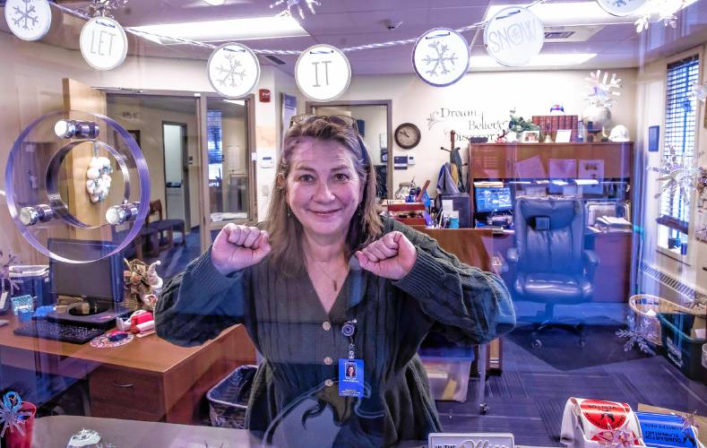 Shelley Westenberg, the principalâs secretary at Dunbarton Elementary, greets visitors to the school on January 29, 2025.