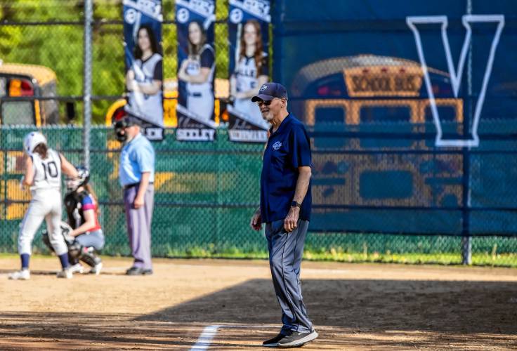 Merrimack Valley JV softball coach Tom Burke at third base in a game against John Stark earlier this month.
