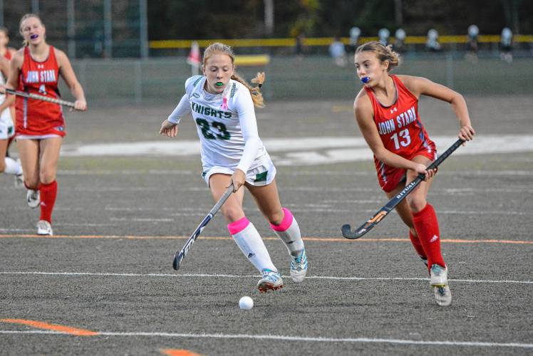 John Stark’s Caylin Worthen (13) moves the ball upfield during field hockey game at Kingswood on Wednesday, Oct. 2, 2024. Worthen scored a goal in the 3-0 victory. John Stark’s Caylin Worthen (13) moves the ball upfield during field hockey game at Kingswood on Wednesday, Oct. 2, 2024. Worthen scored a goal in the 3-0 victory.