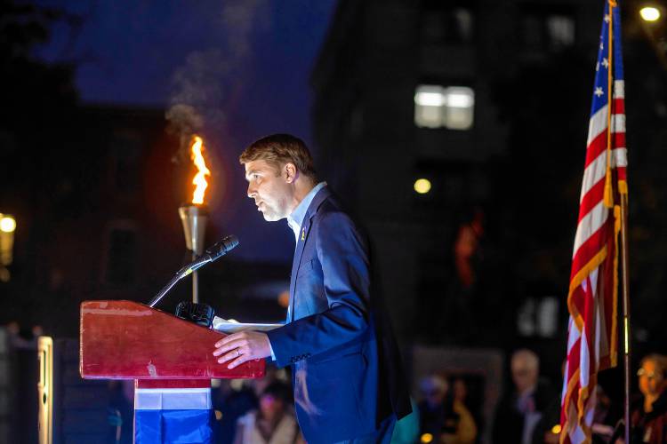 U.S. Rep. Chris Pappas talks to the crowd at the State House on the anniversary of the Hamas attack on Israel on October 7, 2024.