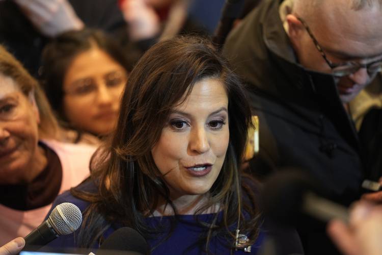 House Republican Conference Chair Elise Stefanik, R-N.Y., speaks with members of the media before a Republican presidential candidate former President Donald Trump campaign event in Concord, N.H., Friday, Jan. 19, 2024. (AP Photo/Matt Rourke)