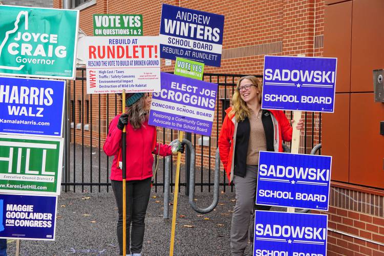 Sarah Sadowski, right, an educational consultant with four kids in Concord Schools, will be the only newcomer to the Concord School Board in 2025. She's pictured with City Councilor Stacey Brown, who held signs outside the polls on Tuesday in Ward 5.