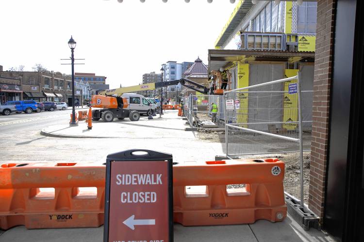 The sidewalk along the west side of South Main Street is often closed as construction continues. It should completely reopen in a month