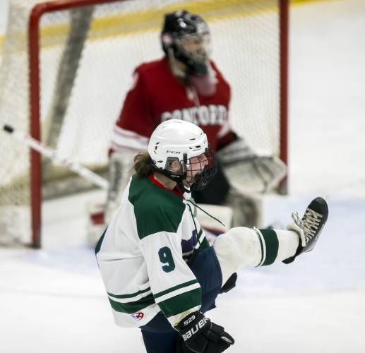 Bishop Brady-Trinity-Londonderry forward Finley Hollenberg kicks up her skate after scoring the third goal against Concord during the second period at the JFK Arena in Manchester on March 3. The newly-formed three-team cooperative program defeated Concord, 5-2, in the quarterfinals.