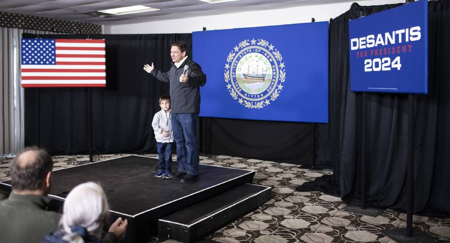 Florida Governor Ron DeSantis reacts after his son Mason declared that Tom Brady was the best quarterback ever at the Grappone Center on Friday, December 15, 2023 for a Never Back Down event in Concord.