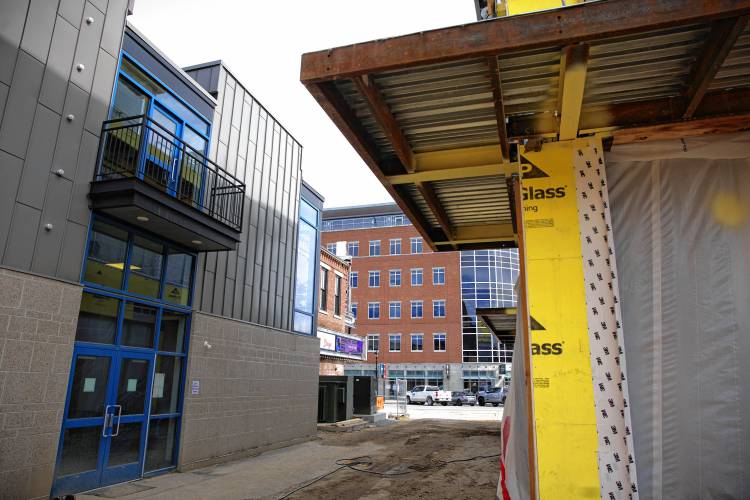 Construction of the Friendly Toast and Arts Alley in downtown Concord is taking shape. The view from the alley looking back toward South Main Street with the Bank of NH Stage is right next door.