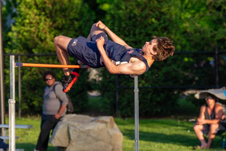 John Stark’s Sam Kinsey-Turner clears the bar while competing in the high jump at the NHIAA Division II championship on May 24 at Oyster River High School in Durham. John Stark should be strong in the field events, once again.