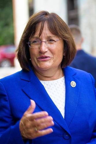 Rep. Ann Kuster talks to members of the media following a campaign stop with Democratic vice presidential candidate Sen. Tim Kaine of Virginia in Concord on Friday, Aug. 12, 2016.