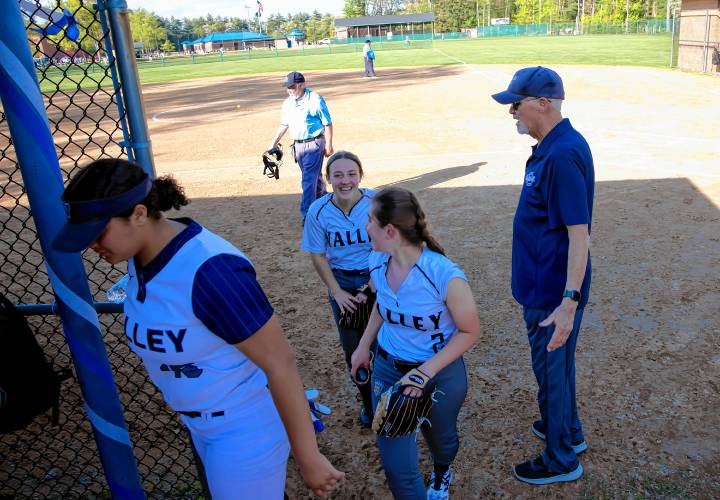 Merrimack Valley JV softball coach Tom Burke encourages his team in between innings in a game against John Stark earlier this month.