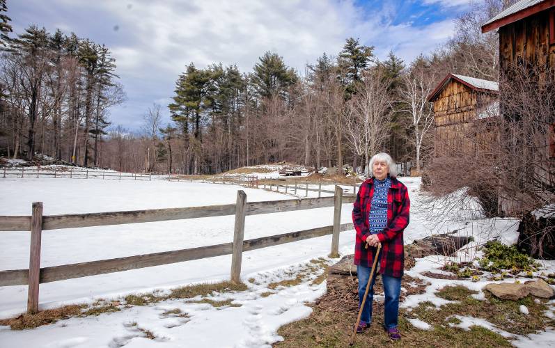 Virginia LaPlante outside the former horse ring used for competitions at her farm in Canterbury on Wednesday, March 27, 2024. New Hampshire Horse Councilâs Board of Directors named LaPlante, New Hampshire's 2024 Horse Person of the Year.