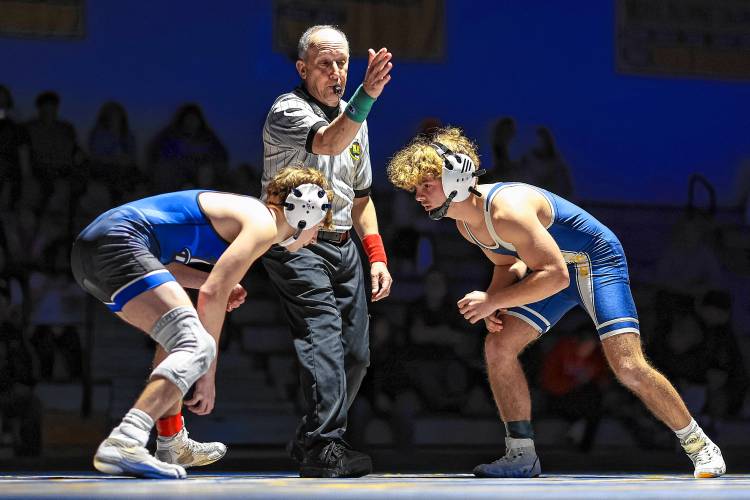Bow’s Sean Flaherty (right) prepares to grapple with an opponent from Pelham in Bow’s season-opening match on Wednesday night. Pelham defeated the defending D-III champion Falcons, 47-27. Bow’s Sean Flaherty (right) prepares to grapple with an opponent from Pelham in Bow’s season-opening match on Wednesday night. Pelham defeated the defending D-III champion Falcons, 47-27.