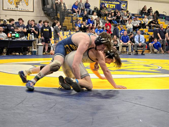 Bow’s Jake Todisco Coulon (top) wrestles Winnisquam’s Dylan Griffin in the 138-pound final at the Division III wrestling state championship at ConVal Regional High School on Saturday. Todisco Coulon won the 138 title to help the Falcons defend their team championship.