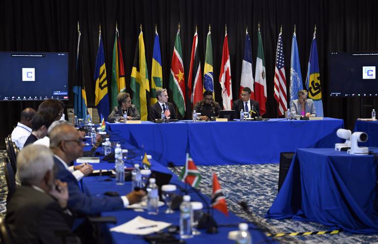 From left, Barbados Prime Minister Mia Mottley, U.S. Secretary of State Antony Blinken, Guyana's President Irfaan Ali and Jamaica's Prime Minister Andrew Holness attend an emergency meeting on Haiti at the Conference of Heads of Government of the Caribbean Community (CARICOM) in Kingston, Jamaica, on Monday, March 11, 2024. (Andrew Caballero-Reynolds, Pool via AP)