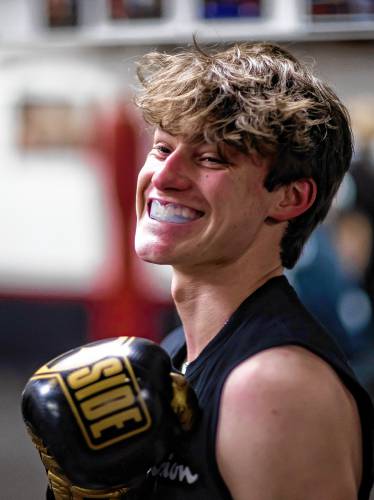 Ronny Philbrick warms up for his boxing class at Averill's Boxing in downtown Concord on March 7, 2024. Philbrick is hoping to box in the future and takes the class with his brother, Ritchie.