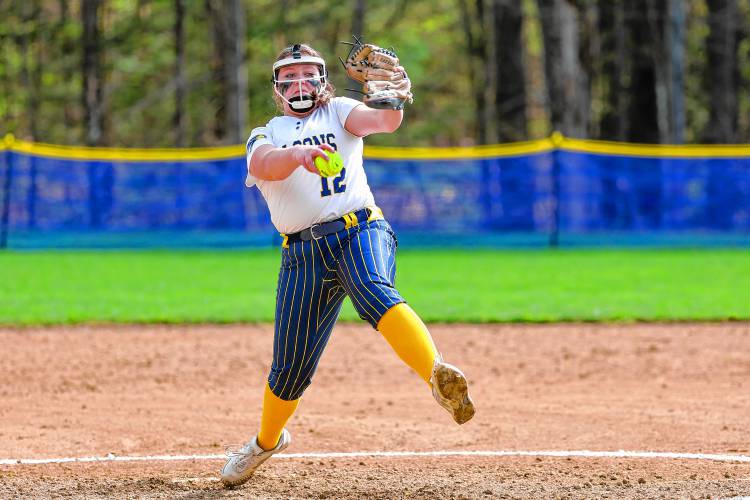 Bow freshman Taylor Ouellette delivers a pitch against Pelham on Friday. Ouellette pitched a complete-game, one-hit shutout, and the Falcons won, 9-0.