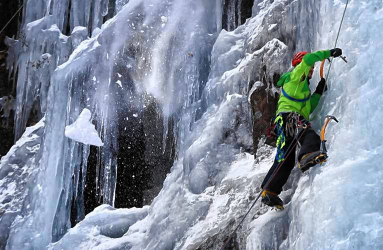 This 2017 photo shows an ice climber ascending Frankenstein Cliff in Hart’s Location, N.H. The ice climber injured this weekend was on Shoestring Gully. 