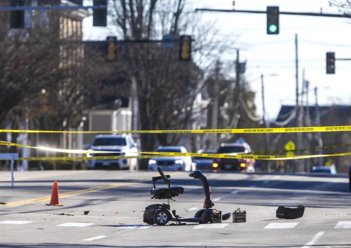 A Concord police cruiser blocks the southbound lanes of North Main Street on Saturday.