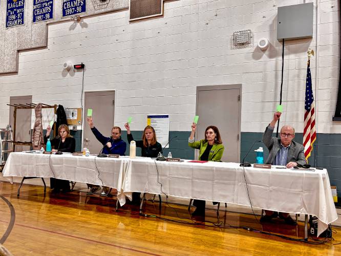 Dunbarton school board votes in favor of increasing teacher salaries at the annual school district meeting on Saturday.