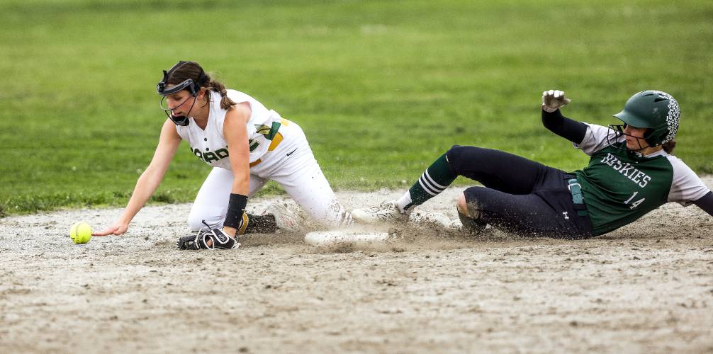 Bishop Brady second baseman Reese Henry can’t come up with the ball as a Monadnock baserunner slides safely on Monday at Rollins Park. Bishop Brady’s season, and 15-game winning streak, came to an end in Monday’s D-III quarterfinal.