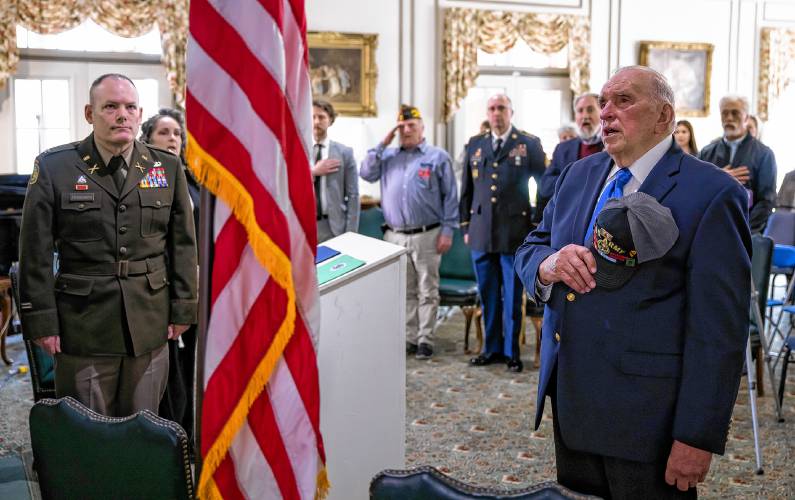  Jerry Lavigne leads the group in the Pledge of Allegiance at his medal ceremony at Pleasant View Retirement Home on Saturday, February 24, 2024.