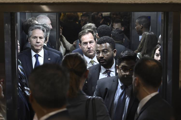 Secretary of State Antony Blinken waits in an elevator before a meeting on Haiti at the Conference of Heads of Government of the Caribbean Community (CARICOM) in Kingston, Jamaica, on Monday, March 11, 2024. (Andrew Caballero-Reynolds, Pool via AP)