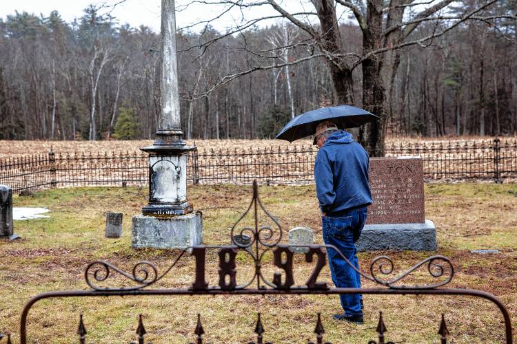 Norm Yeaton enters the second private Yeaton cemetery off of North Road in Epsom on Thursday, April 11, 2024. Yeaton has taken on the arduous research project by Yeaton to understand the sheer volume of people in Epsom whose last name was the same as hia--even when the name was Yeton before they added the ‘a’ early in the 19th century.