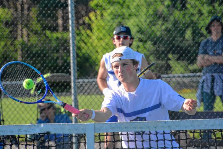 Kearsarge’s Graham West (front) and Liam Miller (back) had an 11-3 doubles record this season, reaching the final four of the state doubles tournament and leading the Cougars to their fourth consecutive D-III finals appearance.