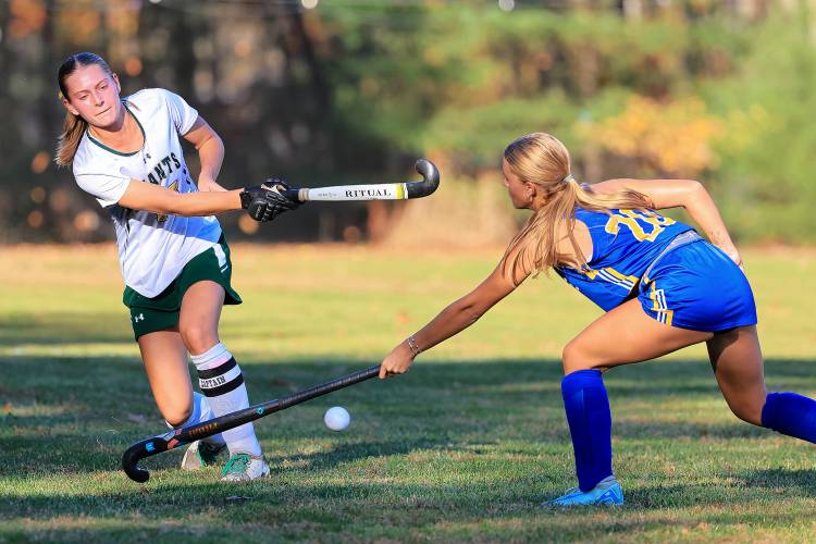 Bishop Brady’s Abigail Tyrell passes past Kearsarge defender Payton MacMichael in Bishop Brady’s 3-1 win on Oct. 1. Bishop Brady’s Abigail Tyrell passes past Kearsarge defender Payton MacMichael in Bishop Brady’s 3-1 win on Oct. 1.