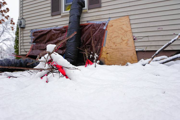 The damage to the Jelley’s home following the crash.