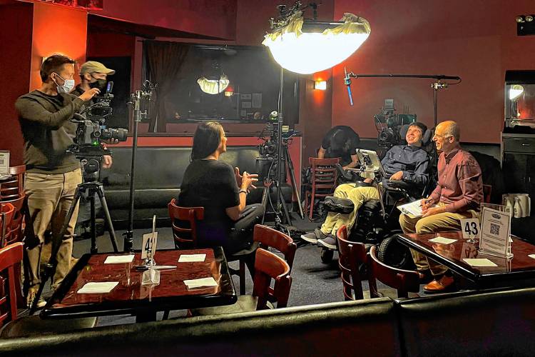 Samuel Habib smiles during an interview with Keith Jones (not pictured) for The Ride Ahead. Credit: Dan Habib/LikeRightNow Films