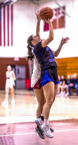 Concord Christian guard Lilli Carlile goes up for a layup against Concord High School on Friday.