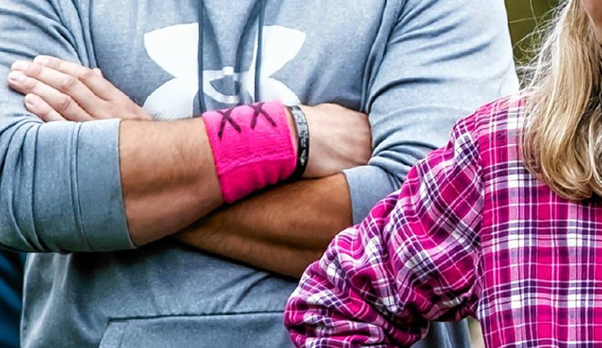 Protesters wear pink armbands on the sidelines of the Bow girls soccer game on Tuesday, Sept. 24, 2024. Protesters wear pink armbands on the sidelines of the Bow girls soccer game on Tuesday, Sept. 24, 2024.