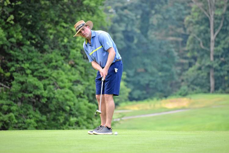 New London's Rob Henley (Lake Sunapee Country Club) putts during the second round of the 121st New Hampshire State Amateur Championship final on Saturday at Concord Country Club. Henley defeated Stephen Goodridge (Eastman Golf Links), 2 and 1, to win his first state am golf title.
