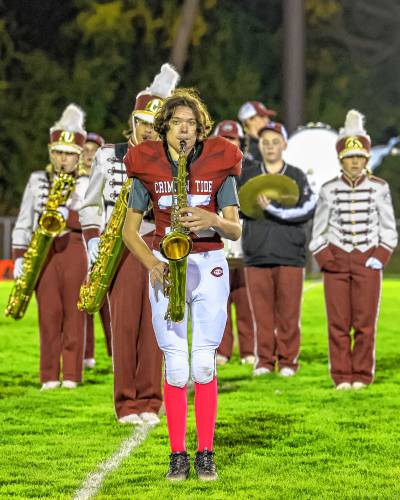 Sebastian Telus (35) is a freshman tight end for the Crimson Tide and a saxophone player in the marching band.
