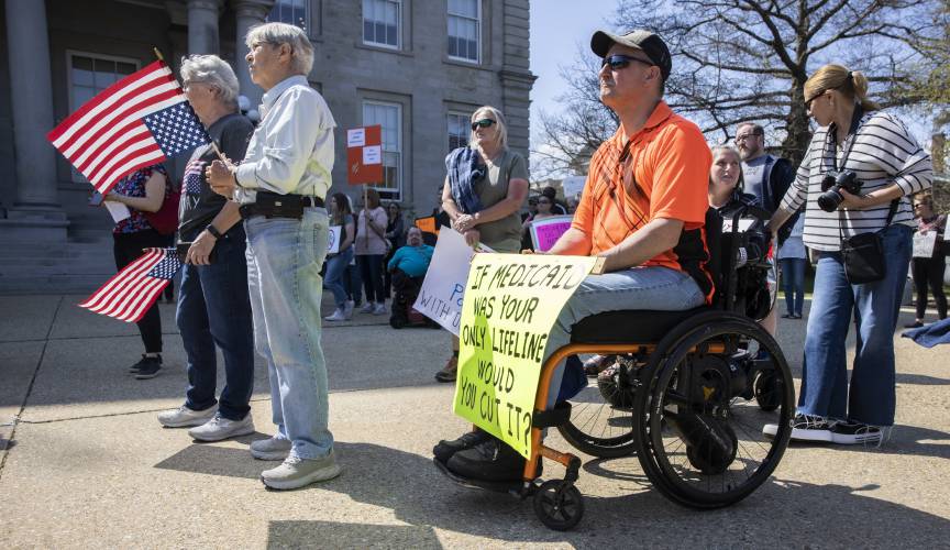 Thomas Jimino from Tuftonboro listened to the speakers at the State House Medicaid rally. Thomas Jimino from Tuftonboro listened to the speakers at the State House Medicaid rally.