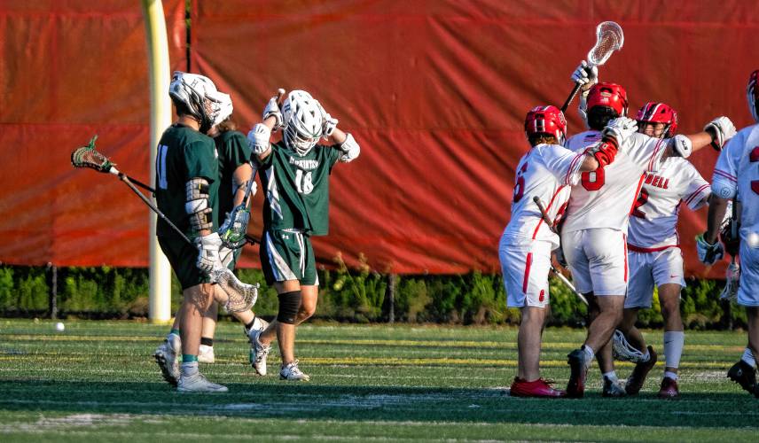 Hopkinton players watch as the Campbell team celebrates a goal in the waning moments of the Div. III semifinal at Bank of NH Stadium in Laconia on Wednesday, June 5, 2024.