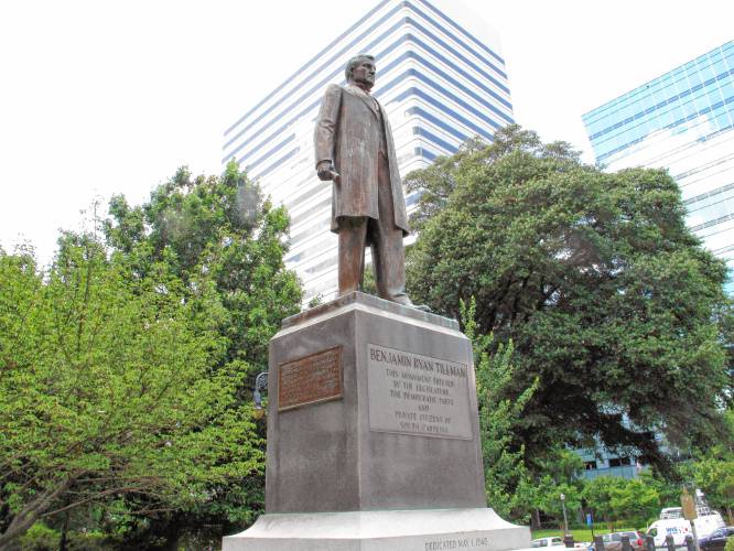 In this July 17, 2015 file photo, the statue honoring former South Carolina governor and U.S. senator “Pitchfork” Ben Tillman is seen on the grounds of the Statehouse in Columbia, S.C. In this July 17, 2015 file photo, the statue honoring former South Carolina governor and U.S. senator “Pitchfork” Ben Tillman is seen on the grounds of the Statehouse in Columbia, S.C.