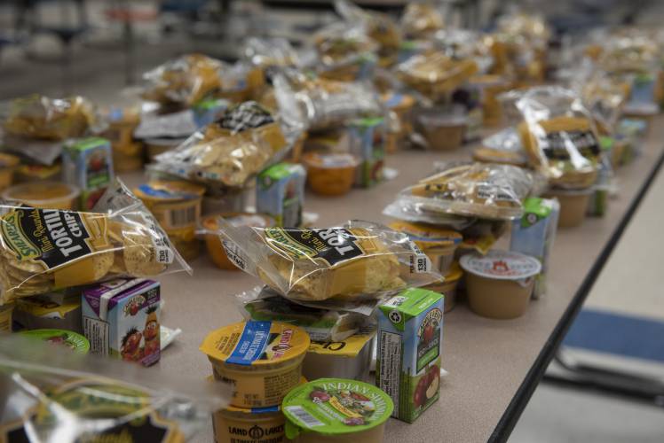 Some of the items for meals in the twice-weekly distributions program are lined up in the JFK Middle School cafeteria on Thursday, April 30, 2020. Friday, May 1, is School Lunch Hero Day. Some of the items for meals in the twice-weekly distributions program are lined up in the JFK Middle School cafeteria on Thursday, April 30, 2020. Friday, May 1, is School Lunch Hero Day.