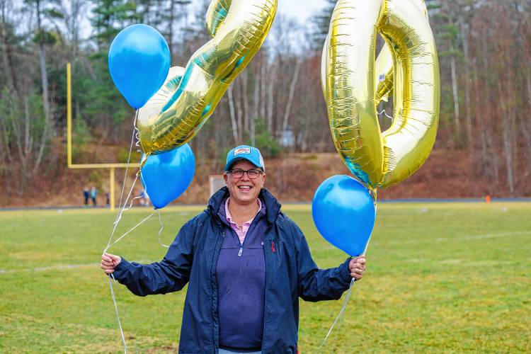 Chris Raabe celebrates her 300th career win as the head coach of Bow girls' lacrosse.