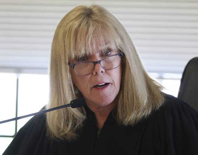 Judge Beverly Cannone instructs the jury after closing arguments in the Karen Read trial at Norfolk Superior Court on Tuesday, June 25, 2024 in Dedham, Mass. Read is accused of killing her boyfriend Boston police Officer John O'Keefe, in 2022. (Nancy Lane/The Boston Herald via AP, Pool)